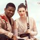 A couple dressed as Finn and Rey for a photoshoot