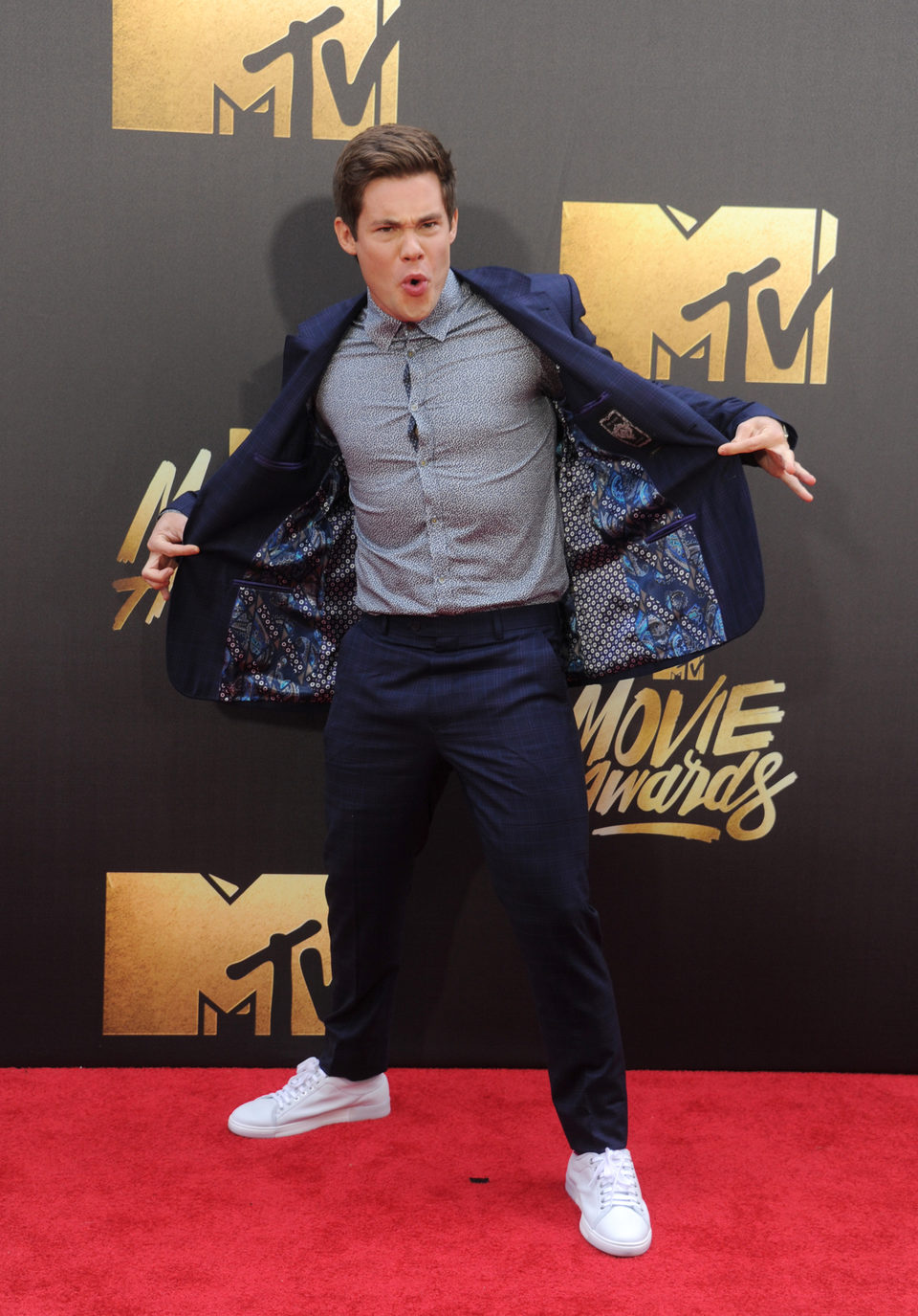 Adam DeVine at the 2016 MTV Movie Awards' red carpet