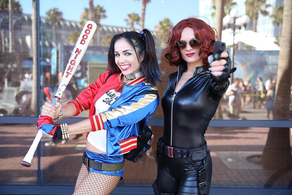 Harley Quinn and Black Widow Cosplay attend the Comic-Con International 2016