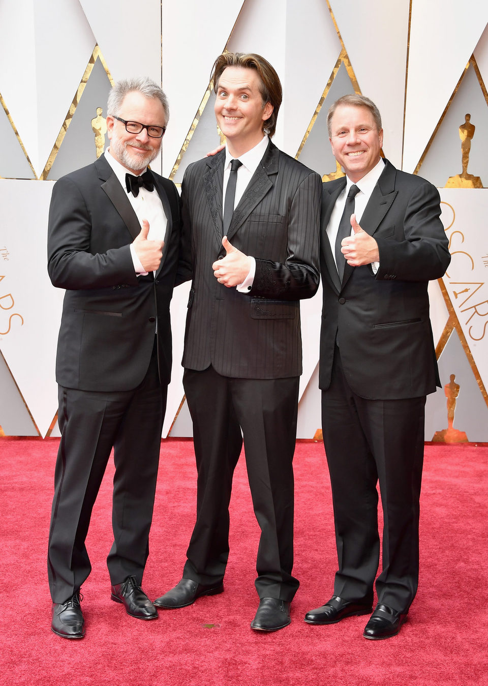 Rich Moore, Byron Howard and Jared Bush at the Oscars 2017 red carpet