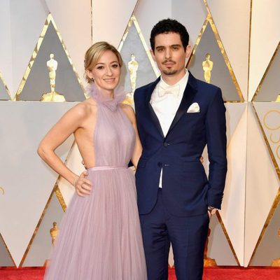 Damien Chazelle and Olivia Hamilton at the red carpet of the Oscars 2017