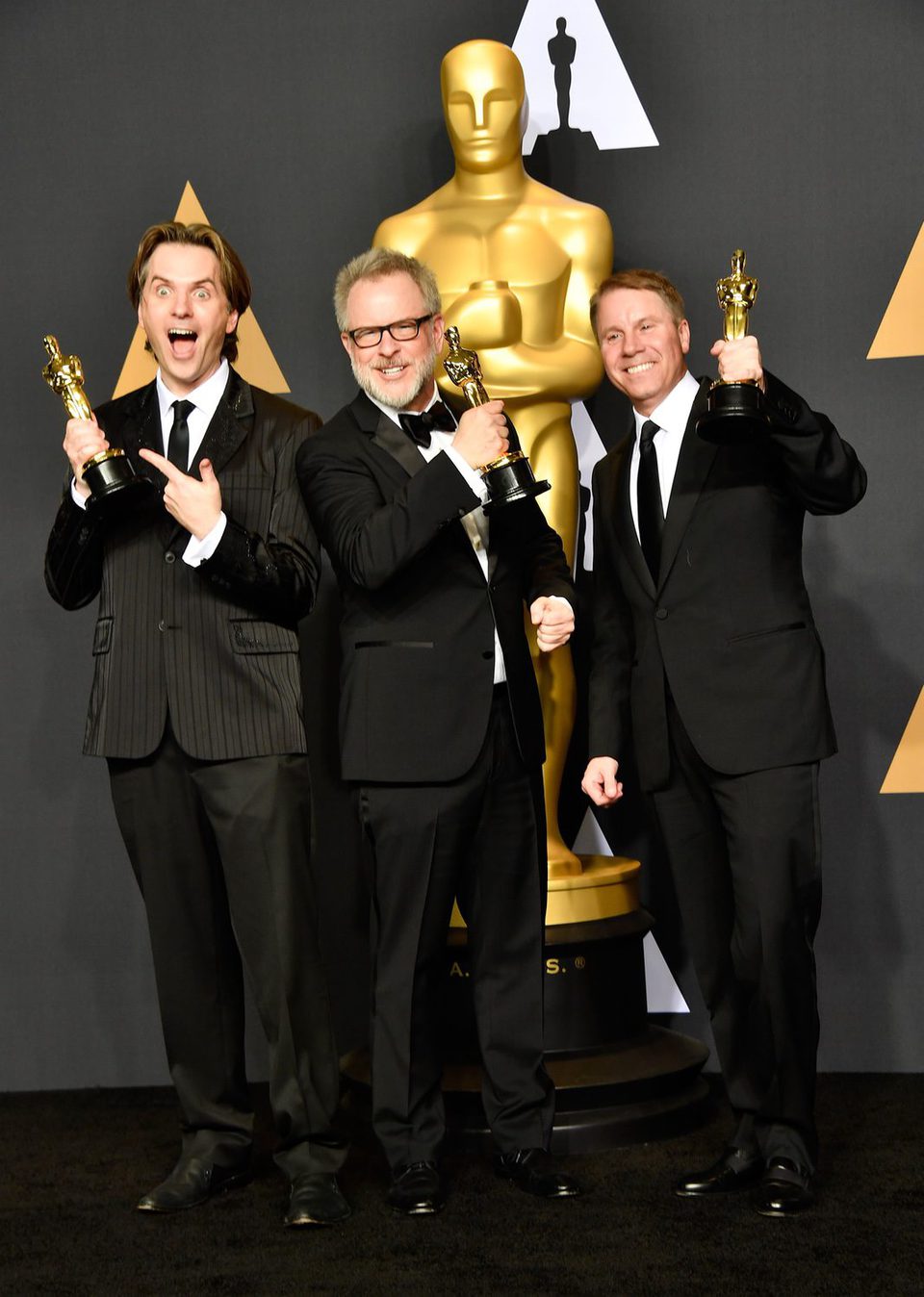 Byron Howard, Rich Moore and Clark Spencer, winner of the Oscar to Best Animated Feature Film for 'Zootopia'