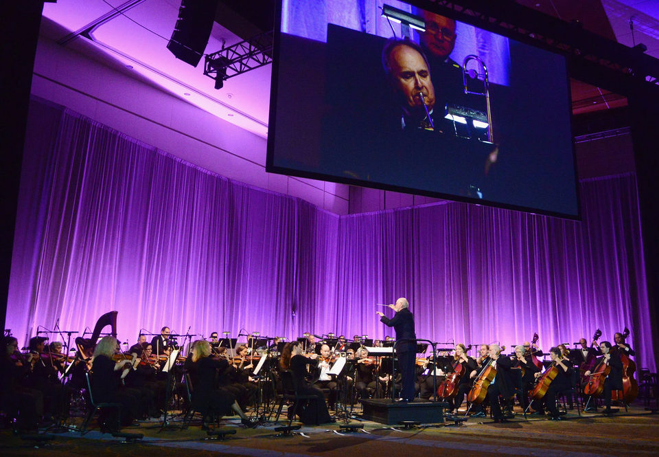 John Williams leading the orchestra in the Star Wars Celebration