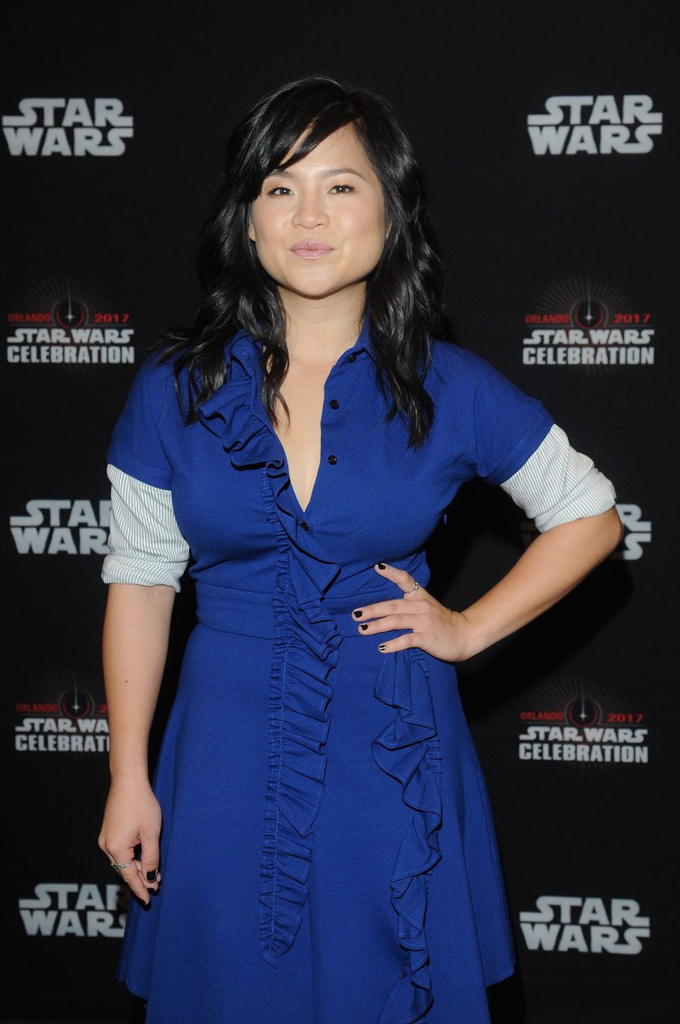 Kelly Marie Tran poses before 'The Last Jedi' panel at the Star Wars Celebration