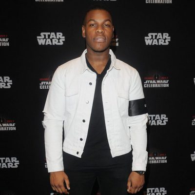 John Boyega goes to Star Wars Celebration, and poses before the panel of 'The Last Jedi'