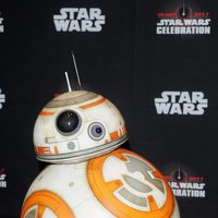 The robot BB-8 poses before the panel of 'The last Jedi' in the Star Wars Celebration