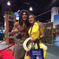 Two fans dressed up like Tarzan and Jane in the D23