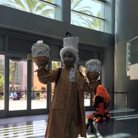 Fan dressed up like Lumiere in the D23