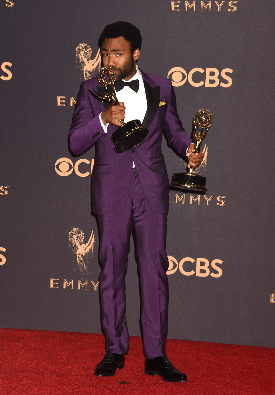 Donald Glover with his Emmy 2017 for best actor and best director of a comedy series