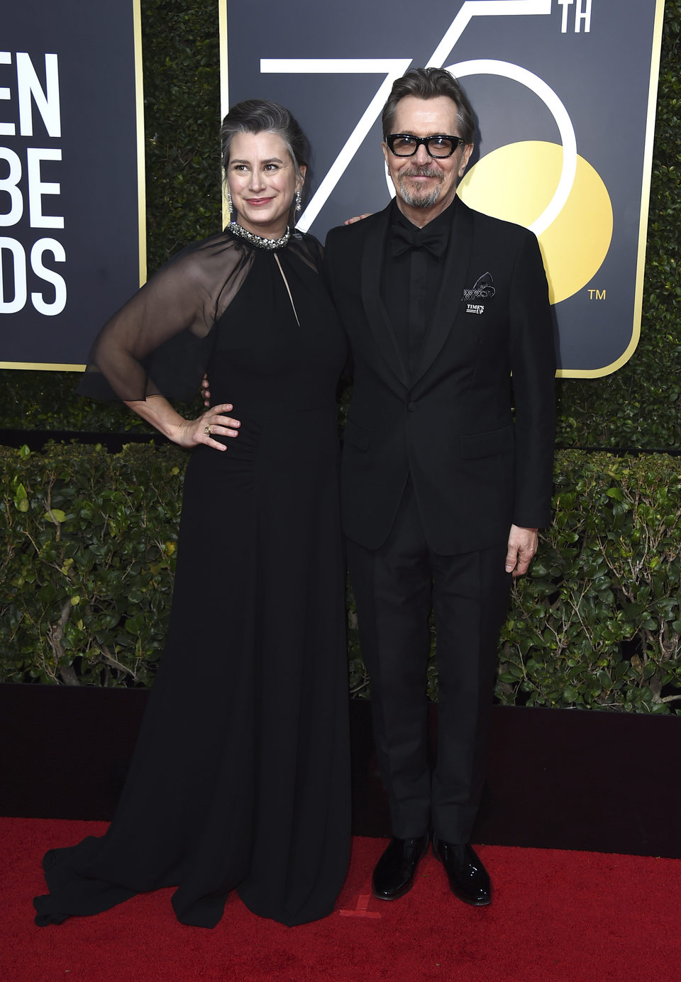 Gary Oldman and his wife at the Golden Globe's red carpet 2018