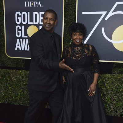 Denzel Washington and his wife at the Golden Globes 2018 red carpet