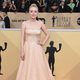 Dakota Fanning poses for the red carpet SAG 2018 cameras