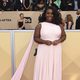 Uzo Aduba smiles for the SAG 2018 cameras