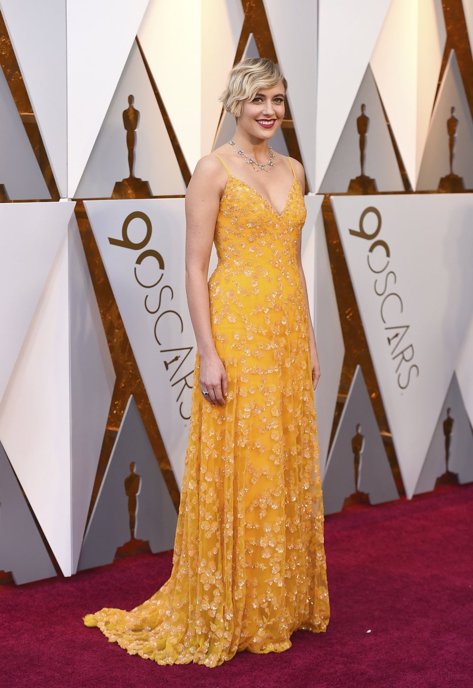 Greta Gerwig poses at the Oscar 2018 red carpet