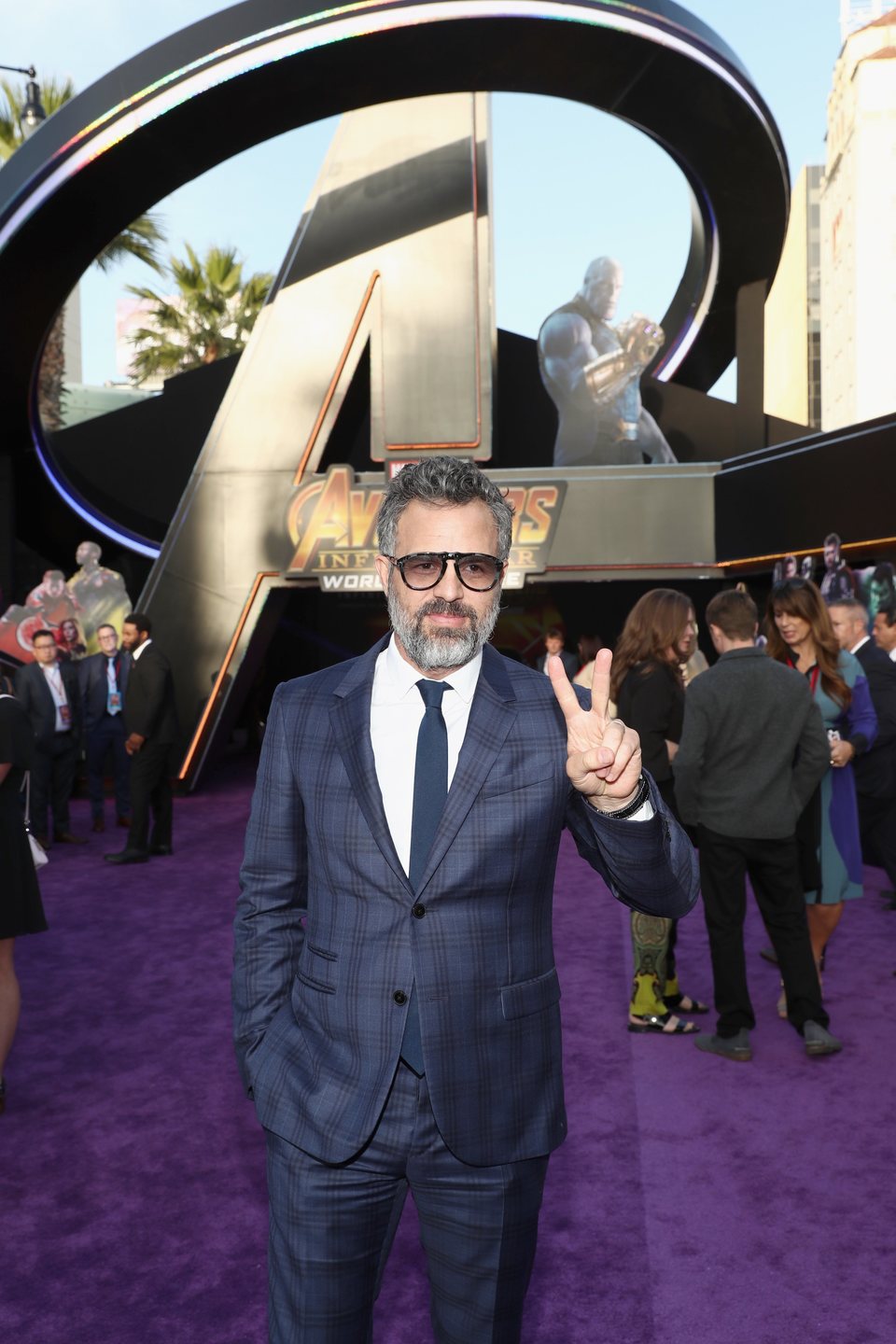 Mark Ruffalo poses on the purple carpet at the world premiere of 'Avengers: Infinity War'