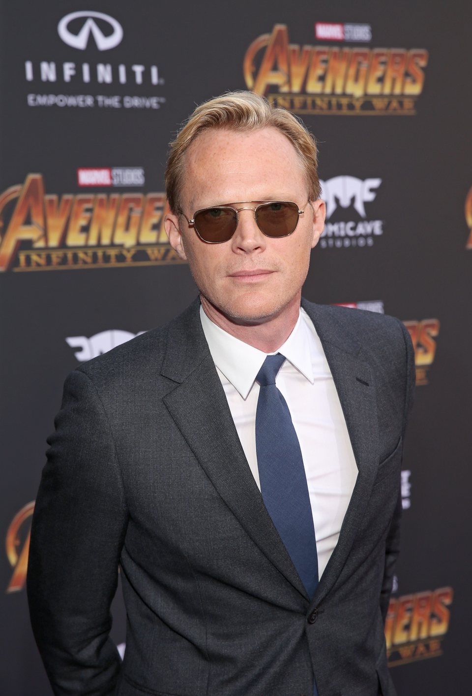 Paul Bettany poses on the purple carpet at the world premiere of 'Avengers: Infinity War'