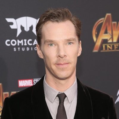 Benedict Cumberbatch poses on the purple carpet at the world premiere of 'Avengers: Infinity War'