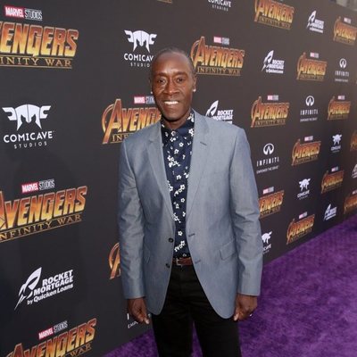 Don Cheadle poses on the purple carpet at the world premiere of 'Avengers: Infinity War'