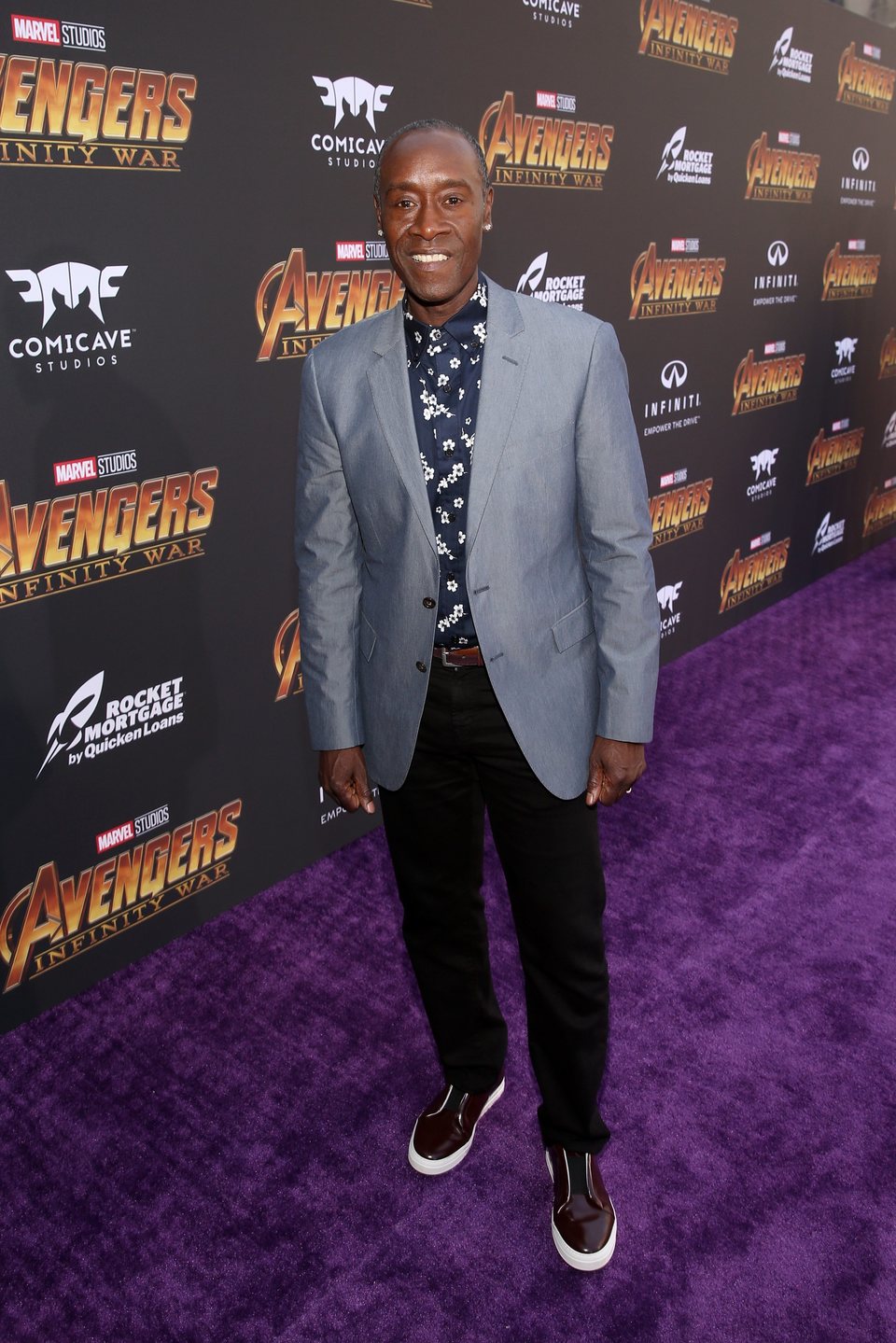 Don Cheadle poses on the purple carpet at the world premiere of 'Avengers: Infinity War'