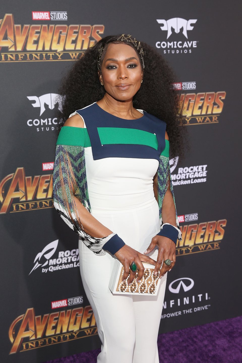 Angela Bassett poses on the purple carpet at the world premiere of 'Avengers: Infinity War'