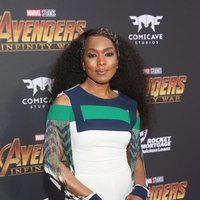 Angela Bassett poses on the purple carpet at the world premiere of 'Avengers: Infinity War'