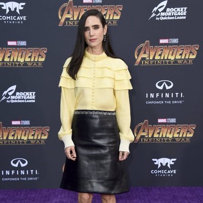 Jennifer Connelly poses on the purple carpet at the world premiere of 'Avengers: Infinity War'