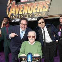 Stan Lee & Jon Favreau pose on the purple carpet at the world premiere of 'Avengers: Infinity War'