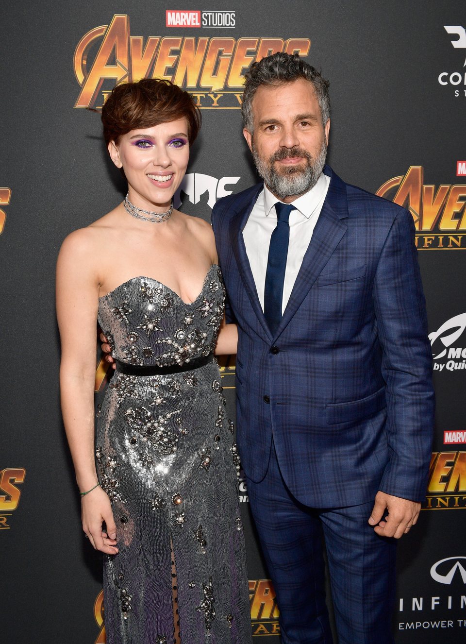 Scarlett Johansson & Mark Ruffalo pose on the purple carpet at the world premiere of 'Avengers: Infinity War'