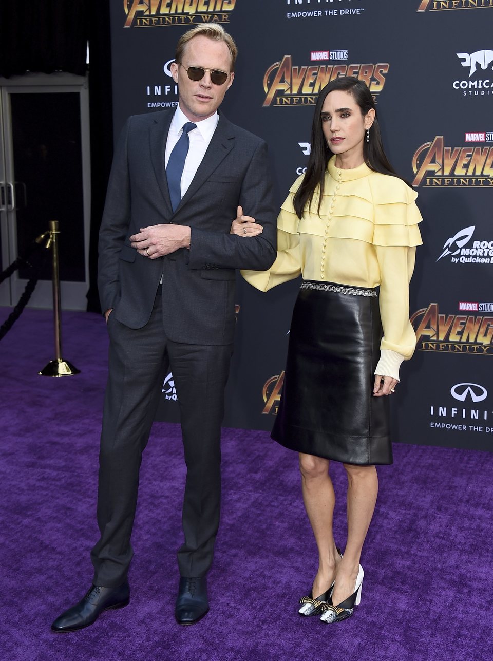 Paul Bettany & Jennifer Connelly pose on the purple carpet at the world premiere of 'Avengers: Infinity War'