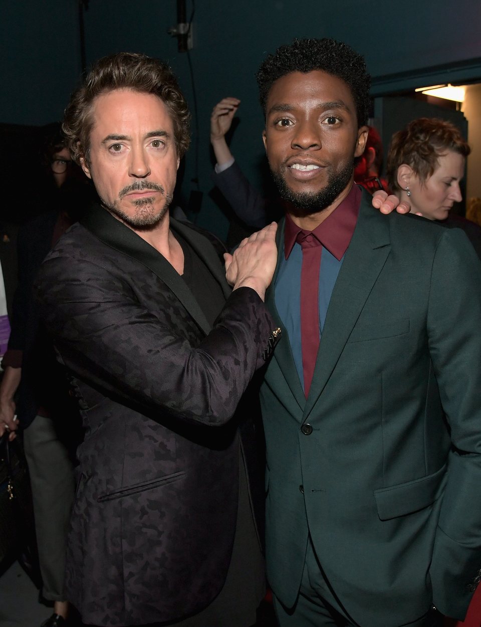 Robert Downey Jr. & Chadwick Boseman pose on the purple carpet at the world premiere of 'Avengers: Infinity War'