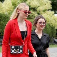 Sophie Turner and Maisie Williams arrive at the wedding of Kit Harington and Rose Leslie