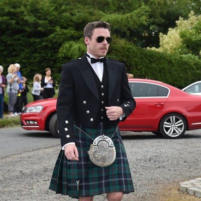 Richard Madden arrives at the wedding of Kit Harington and Rose Leslie