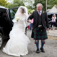 Rose Leslie and her father arrive at the ceremony