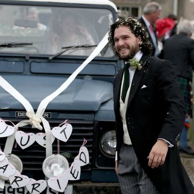 Kit Harington smiling at his wedding ceremony