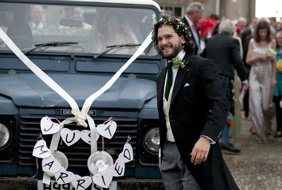 Kit Harington smiling at his wedding ceremony